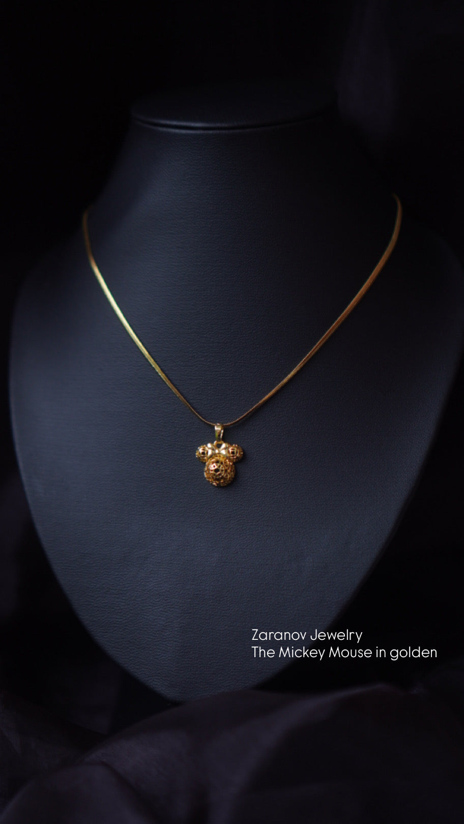 The Mickey Mouse in golden necklace